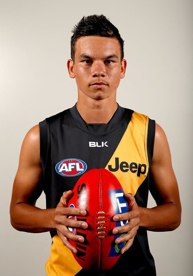 AFL 2015 Media - NAB AFL Draft ADELAIDE, AUSTRALIA - NOVEMBER 24: Number 15 draft pick Daniel Rioli for the Tigers during the NAB AFL Draft at the Adelaide Convention Centre, Adelaide, Australia on November 24, 2015. (Photo by Sean Garnsworthy/AFL Media)